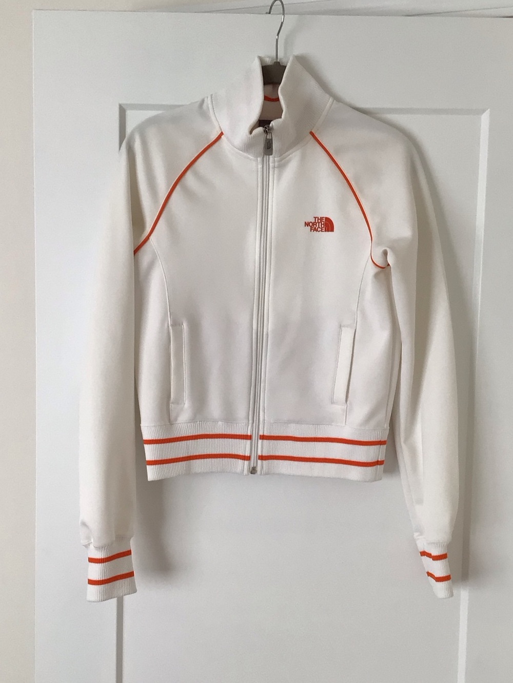The North Face Women's White Track Jacket with Orange Trim
